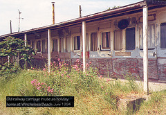 Panelled two-tone railway coach at Winchelsea Beach in June 1994
