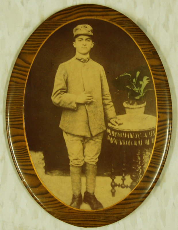 A Soldier Posing with a Plant