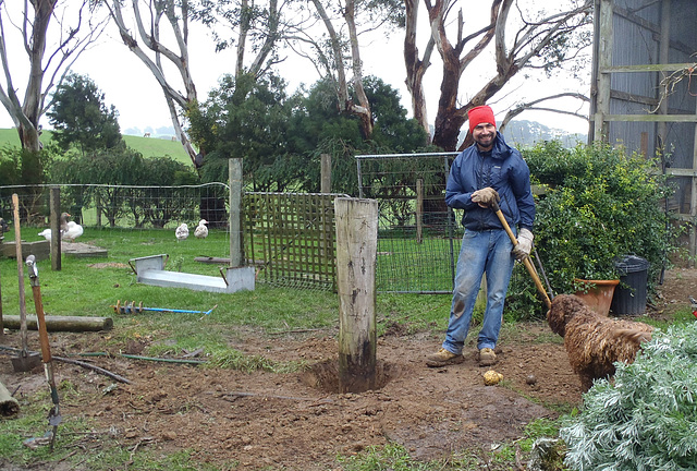 Juan digging out the gatepost