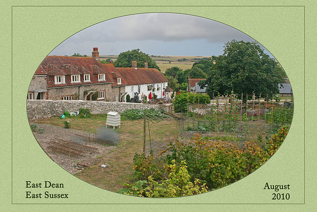 East Dean - The Tiger Inn viewed across a garden