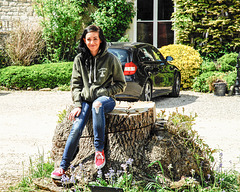 Girl On A Tree Stump