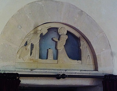 bradenham church, bucks.patron st.botolph carved into the inner tympanum of the early norman doorway, a gill-like work probably of the 1930s.  pevsner is mistaken in calling this francis