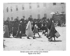 Street scene with women and children marching Egypt c1913