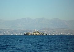 Pharos Peristeres with some blocky Albanian buildings