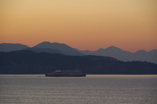 A cruiser sets off before dawn