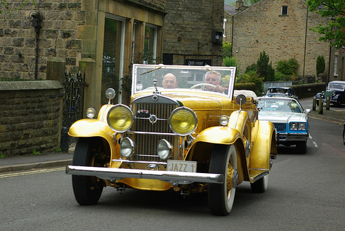 Parade of cars attending the Glossop Car Show