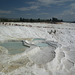 The line of paddling people at top gives some idea of scale.