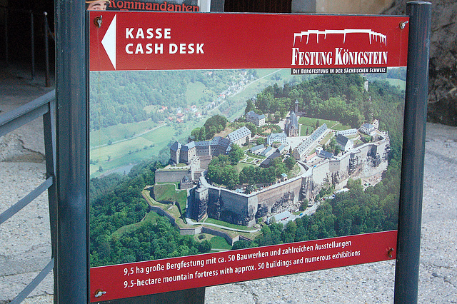 al la kaso (Zur Kasse)