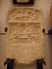 Musée national d'archéologie : dédicace à Mithra en grec.