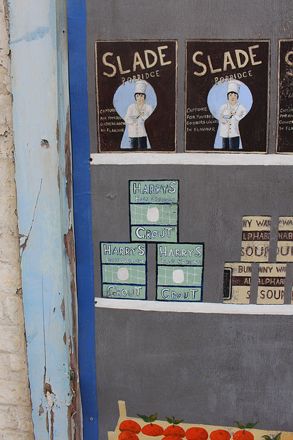 Detail of mural on empty shop, High Street, Chatteris, Cambridgeshire