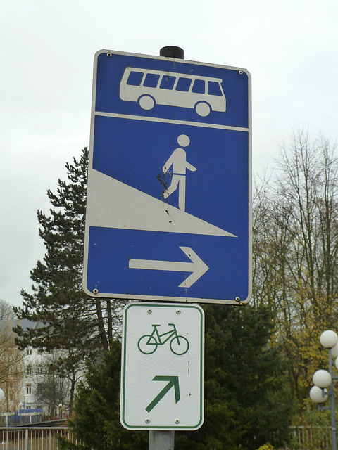 Mr. Stick, a bicycle and a bus