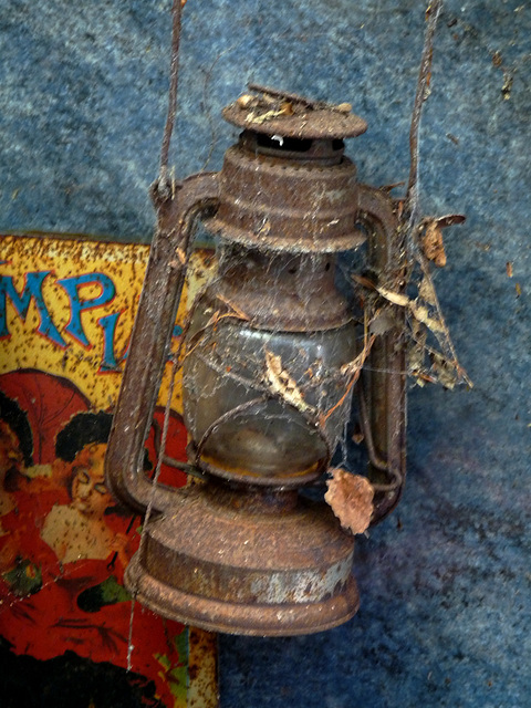 Hurricane Lamp and Enamel Sign