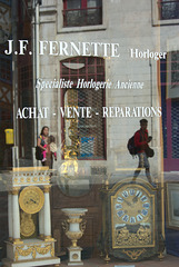 Shop window in Rouen, with passers by - May 2011