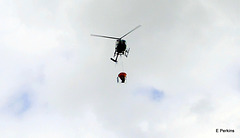 Helicopter with monsoon bucket