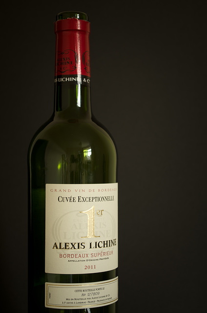 Wine bottle with red top