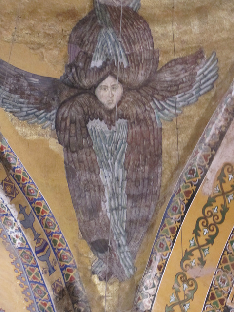 Example of a recently uncovered seraphim icon mosaic concealed when the church was converted to a mosque.  The seraphim had three pairs of wings: one to cover the body and feet, one to cover the face 