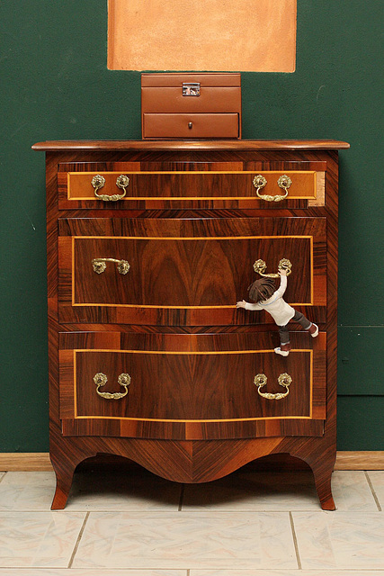 Climbing A Chest Of Drawers