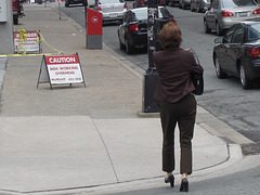 Lady Caution in high heels / La Dame Caution en talons hauts.