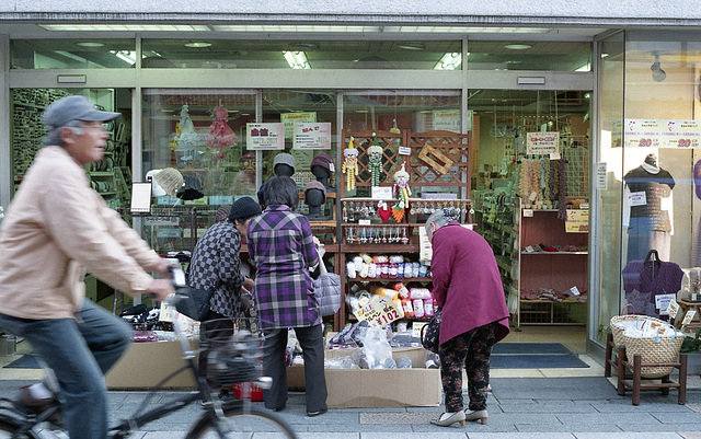 In front of a handicraft shop