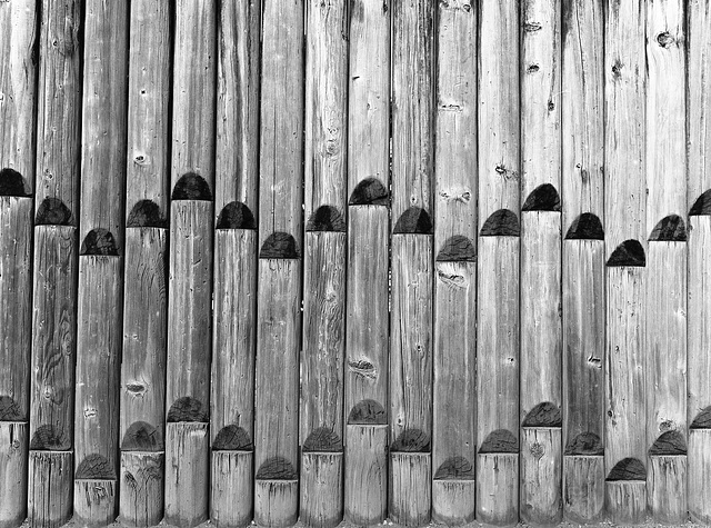 Climbing wall of poles