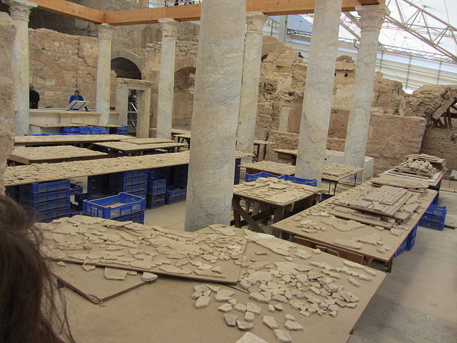 The enormous jigsaw puzzle. Interior views of the "terrace houses," houses of wealthy citizens that are undergoing restoration.