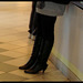Landgång Lady in patent leather high-heeled boots / Jeune Suédoise en bottes de cuir patent à talons hauts.