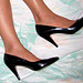 wife in black caressa heels