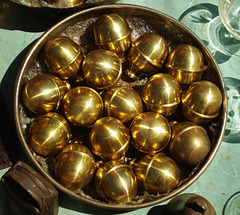 Still life with brass balls