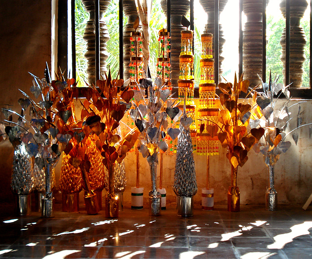 Backlit Buddhist paraphernalia