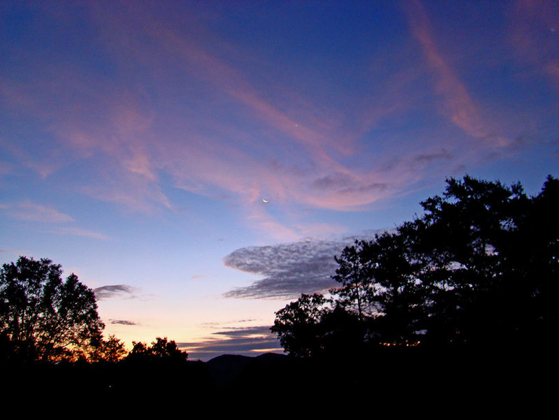 Sunrise with crescent moon and venus