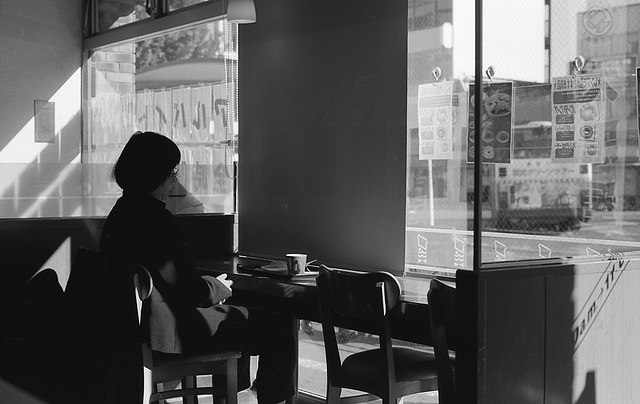 Woman at a donut shop