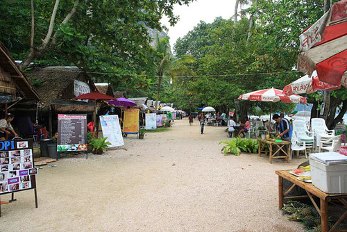 By the beach in Ao Nang, rows of people offering massage