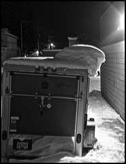 Snow on motorcycle trailer.