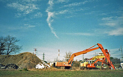 Excavators under the sky