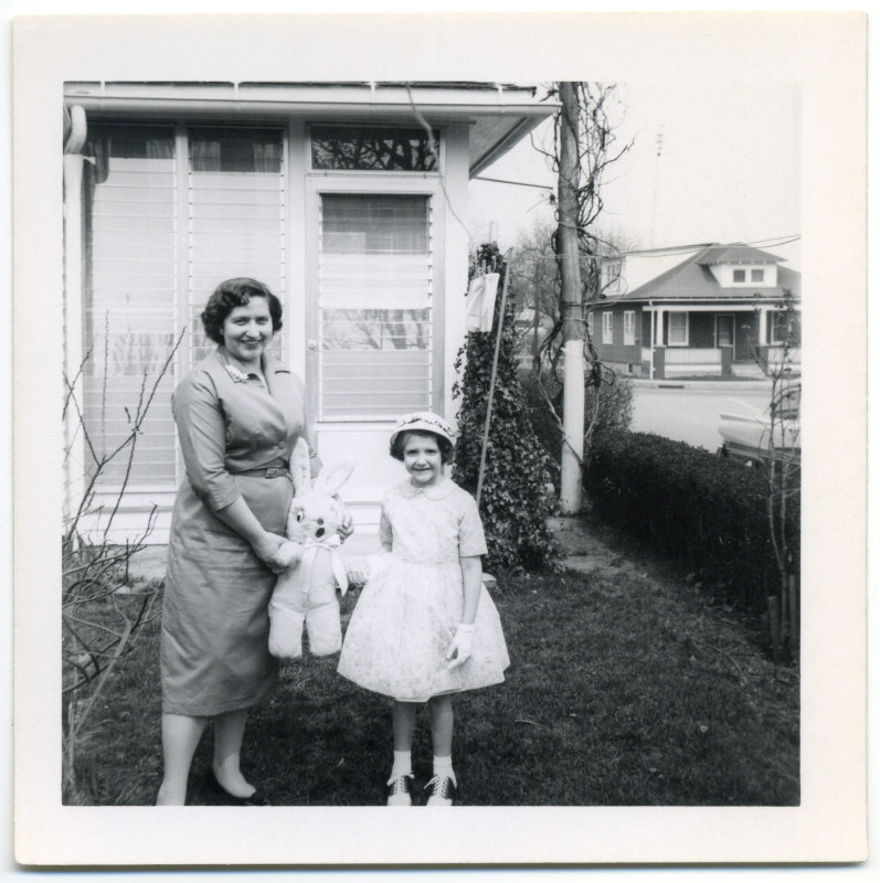 A Girl with Her Bunny and Mom