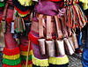The cowbells they so easily use in their dance around the girls.