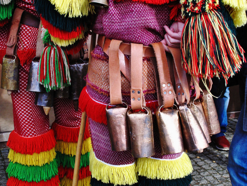 The cowbells they so easily use in their dance around the girls.