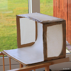 The Mk1 Lightbox: cardboard carton, three baking paper windows, and the back of an old calendar