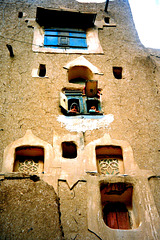 Children looking out of a balcony