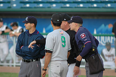 Umpires Victor Carapazza, Grant Menke, managers Carlos Subero, Ken Joyce