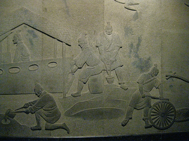workmen preparing the Emperor's tomb