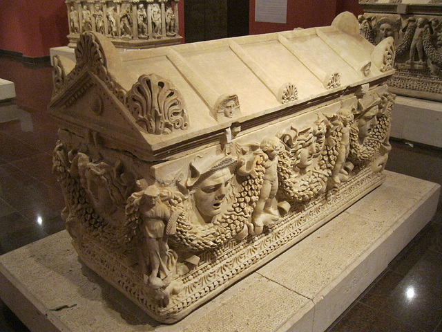 sarcophagus with masks