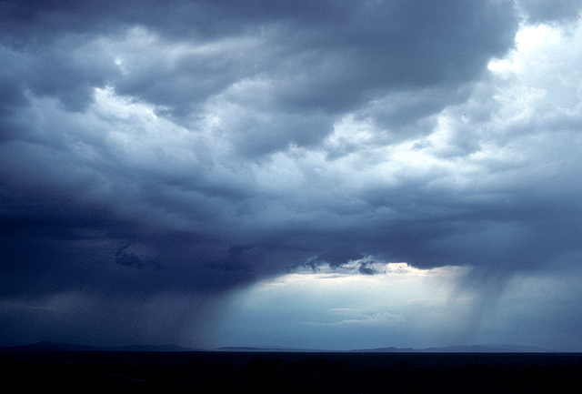 rain, distant mountains