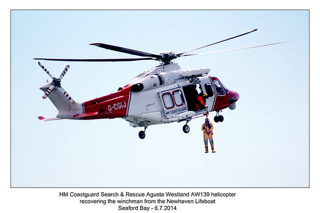 Coastguard Agusta Westland AW139 recovering its winchman - RNLI & Coastguard Joint Exercise - Seaford Bay - 6.7.2014