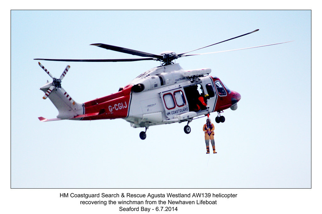 Coastguard Agusta Westland AW139 recovering its winchman - RNLI & Coastguard Joint Exercise - Seaford Bay - 6.7.2014