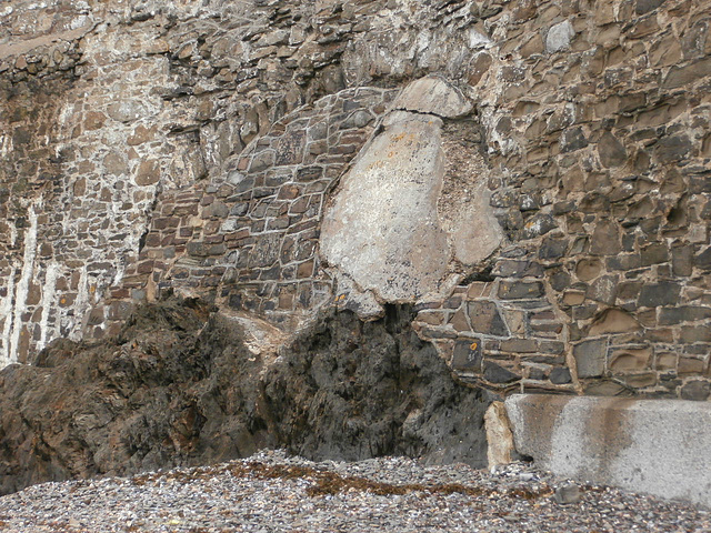 Incredible wall of many types of building, stones, pebbles, concrete, rocks etc.