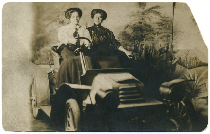 Two Women Driving Along