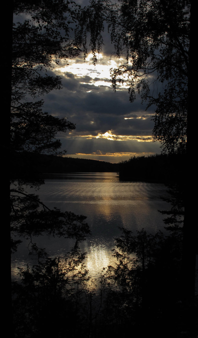 sun behind the clouds