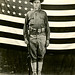 Soldier with Gun and Flag