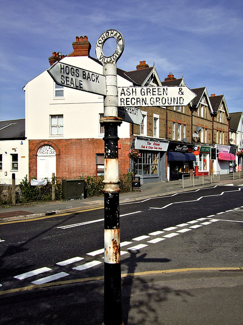 Old cross roads finger sign